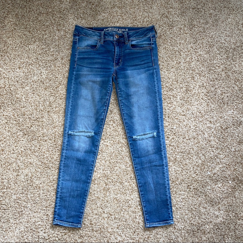 American Eagle skinny jeans. Size 6short with rips on the knees.